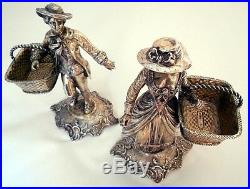 A magnificent pair of cast solid silver Figural salt-cellars, Hanau, Germany c. 1