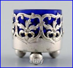 A pair of English salt cellar with glass inserts in blue of English silver plate