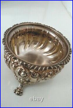 Antique Howard co sterling silver repousse open master salt cellar with lion feet