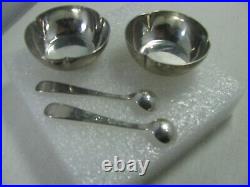 Matching set of Hammered Sterling Silver Kalo Shop Open Salts with matching spoons