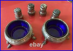 Pair of Sterling Silver Salt Cellars and Four Sterling Silver Shakers