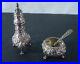 S-Kirk-Sons-Sterling-silver-Repousse-salt-cellar-with-spoon-and-pepper-shaker-01-gy