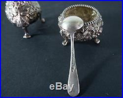 S. Kirk & Sons Sterling silver Repousse salt cellar with spoon and pepper shaker