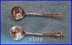 Set of 2 Victorian sterling silver salt cellars with spoons
