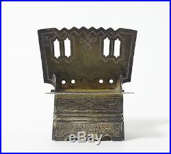 Solid silver salt cellar in a shape of a chair with the proverb. Moscow, 1875