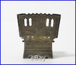 Solid silver salt cellar in a shape of a chair with the proverb. Moscow, 1875