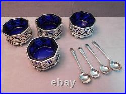 Sterling Salt cellars, blue glass liners, salt spoons British hallmarked