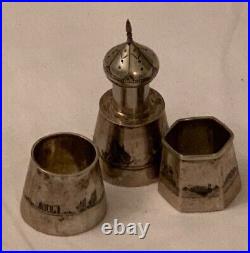 Three antique Middle Eastern niello silver salt and pepper shaker and cellars